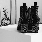 Calzado plano y botas por encima de la rodilla, tendencia